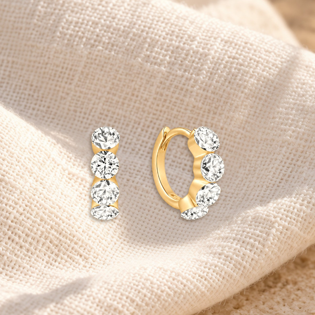 Lume diamond huggies on cream linen