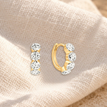 Lume diamond huggies on cream linen