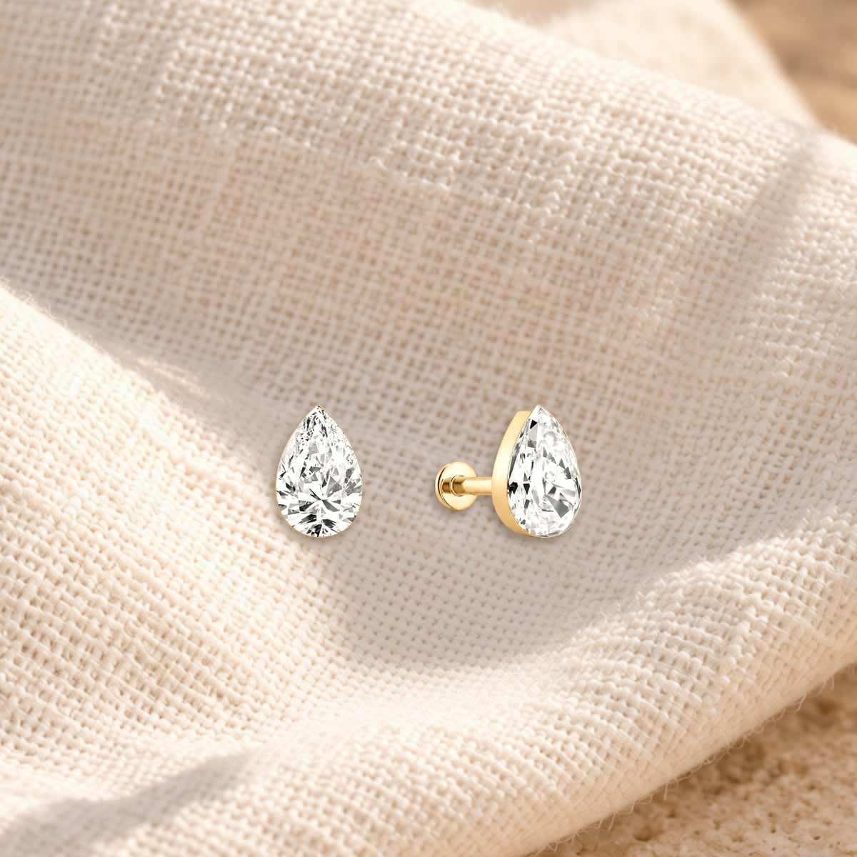 Pera pear diamond flatback studs on cream linen