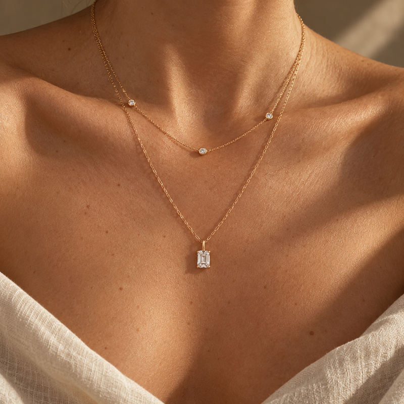 Pontos de Luz and Clara necklaces layered, styled image; sold separately