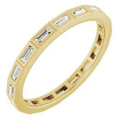 Traço baguette bezel eternity band in 14K yellow gold