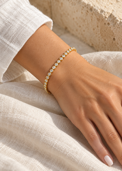 Round bezel CZ bracelet worn alone — digitally styled illustration; fit varies