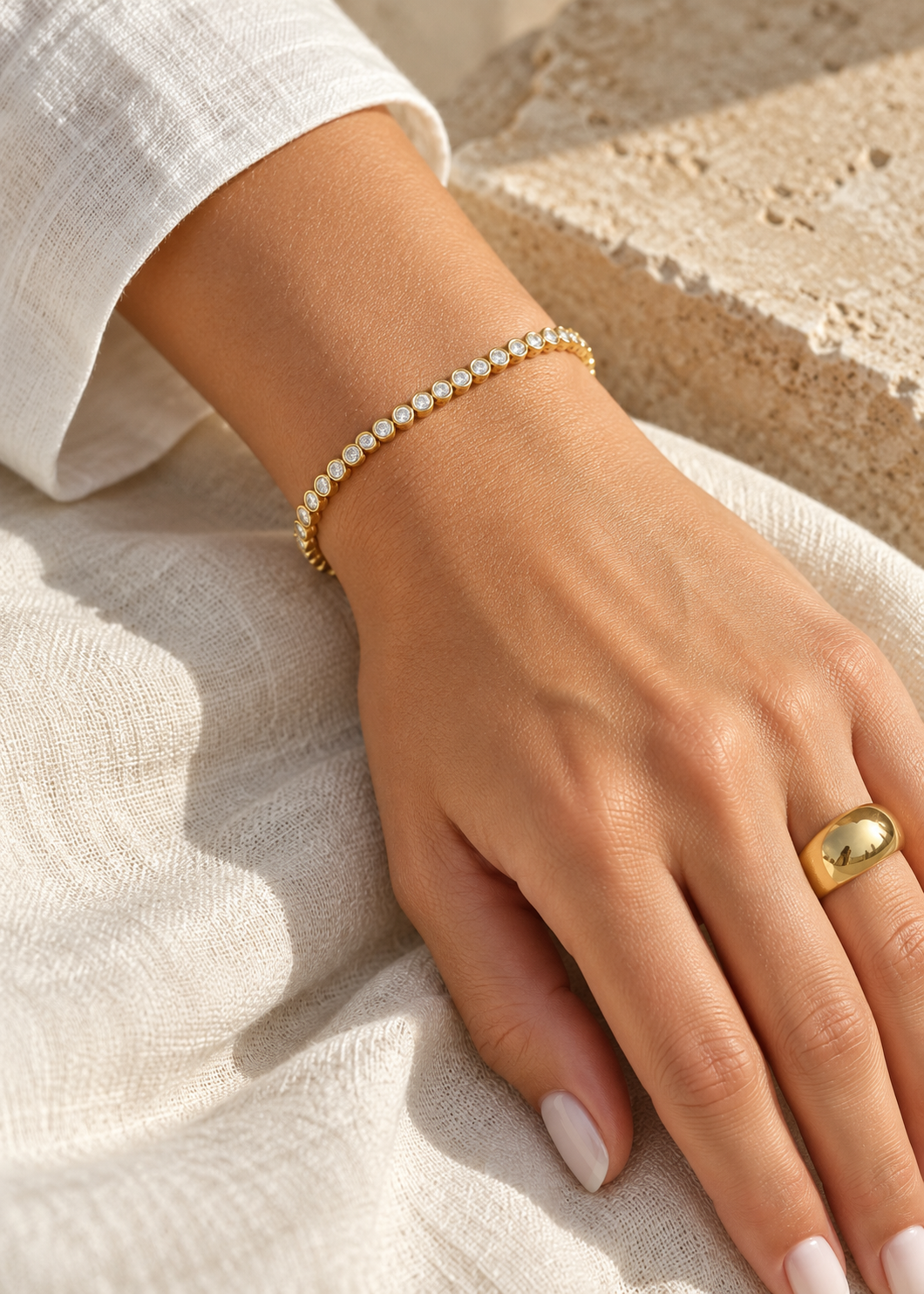 Round bezel CZ bracelet styled with Colina ring, sold separately — digitally styled illustration; fit varies